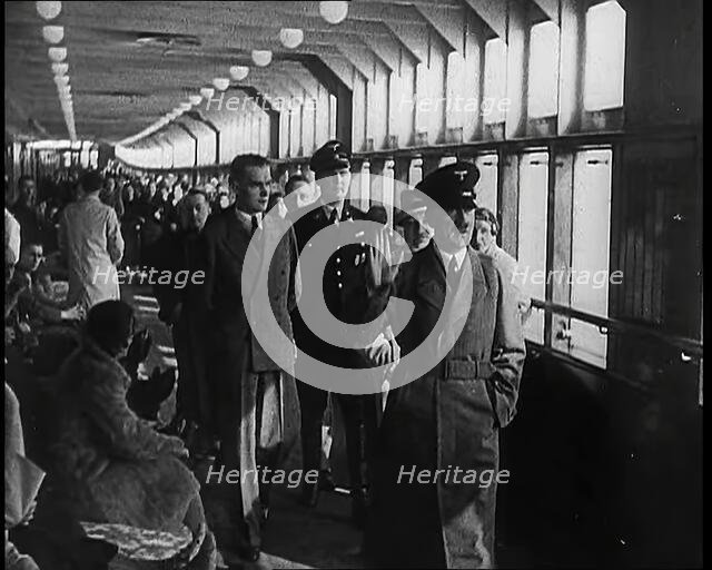 Adolf Hitler, the German Leader, Walking Down a Long Corridor With German Official and..., 1939. Creator: British Pathe Ltd.