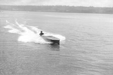 Power boat under way, 1914. Creator: Kirk & Sons of Cowes.