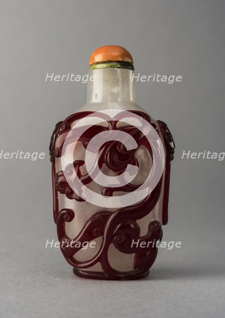 Clear glass snuff bottle with red overlay, China, Qing dynasty, 1644-1911. Creator: Unknown.