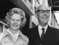 Margaret Thatcher and her husband Denis leaving Heathrow Airport for Brittany, 18th August 1975. Artist: Unknown