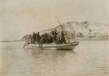 Squad of sappers and miners coming ashore in a sampan at Chemulpo, c1904. Creator: Robert Lee Dunn.