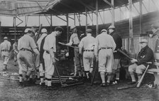 Cleveland [AL] ball players selecting new bats; Graney on bench, 1910. Creator: Bain News Service.