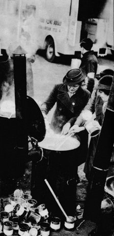 'The W.V.S. Did Many Jobs. Here is a W.V.S. woman managing a field kitchen ', c1941 (1942). Artist: Unknown.