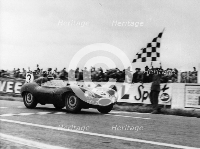 Ken Wharton in a Jaguar D Type, Rheims 12 Hours Race, France, 3rd July 1954. Artist: Unknown