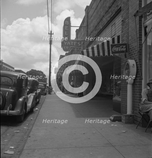 The main street, Fayetteville Street, of Siler City, North Carolina, 1939. Creator: Dorothea Lange.
