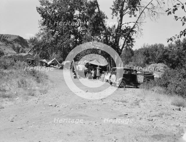 Three migratory families in "Ramblers Park", Washington, Yakima Valley, 1939. Creator: Dorothea Lange.