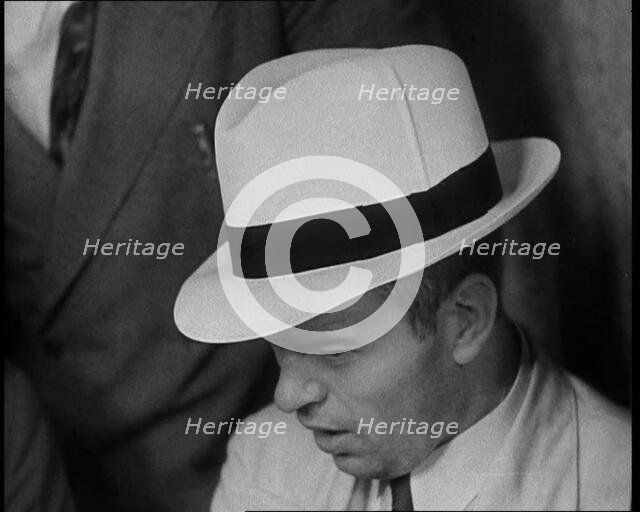 A Group of Male American Civilians Dressed in a Gangster Fashion, 1930. Creator: British Pathe Ltd.