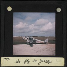 The Guernsey and Jersey Airways de Havilland D H 86 Express G-ACZP on a runway, perhaps at..., 1939. Creator: Norman Kingsley Harrison.