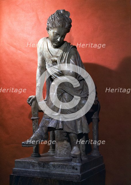 Young woman with injured arm, piece in marble.