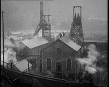 Views Over an Industrial Site in the United Kingdom. Chimney Stacks Are Smoking, 1921. Creator: British Pathe Ltd.