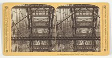 Looking through the Ferris Wheel, near the top, 1893. Creator: Henry Hamilton Bennett.