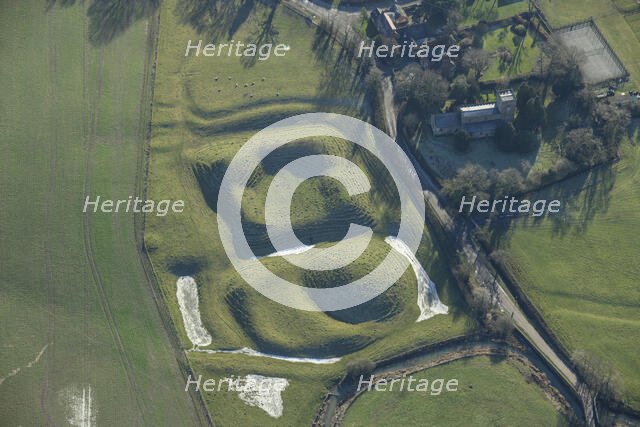 Motte and bailey castle and fishpond earthwork, Lilbourne, Northamptonshire, 2023. Creator: Damian Grady.