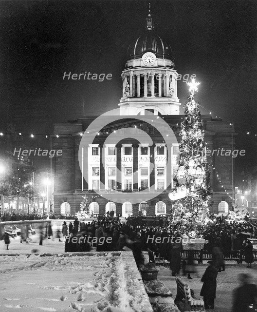 Christmas illuminations in the Market Square, Nottingham, Nottinghamshire, c1950s. Artist: Edgar Lloyd