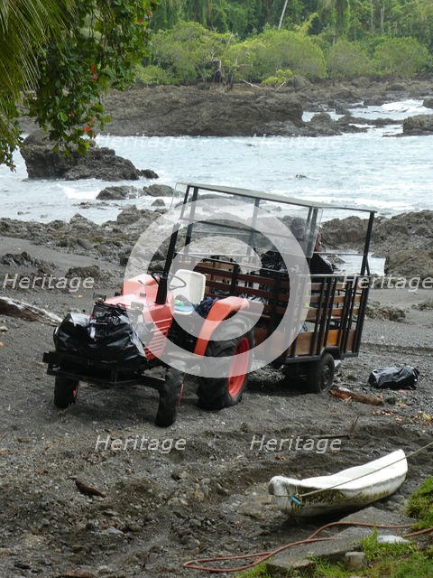 Tractor for transporting tourista and luggage from river arrival at hotel, Costa Rica 2018. Creator: Unknown.