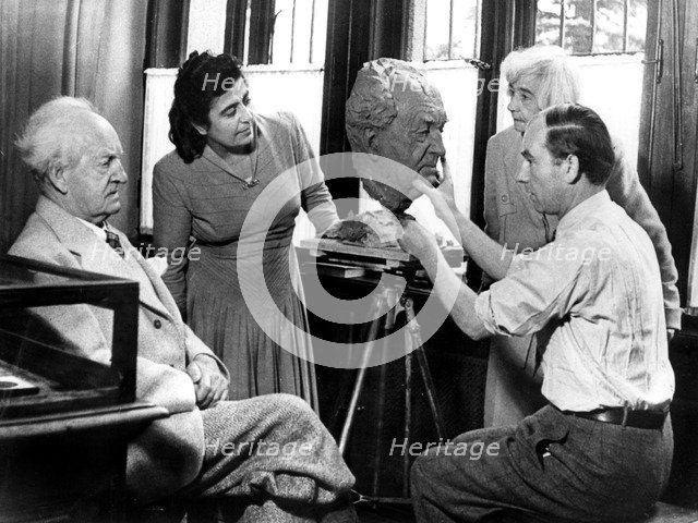 Arno Breker, German sculptor, working on a bust of Gerhart Hauptmann, 26 October 1942. Artist: Unknown
