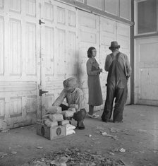 Outside the FSA grant office during pea harvest, Calipatria, California, 1939. Creator: Dorothea Lange.