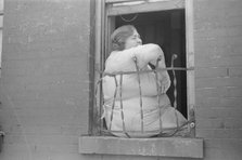 A tenant, 61st Street between 1st and 3rd Avenues, New York, 1938. Creator: Walker Evans.