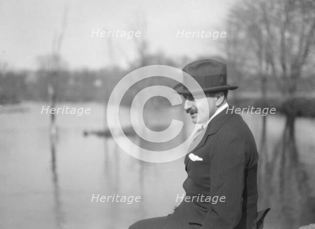 Unidentified man, seated outdoors, between 1896 and 1942. Creator: Arnold Genthe.