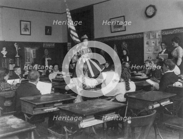 Public school students in art class sketching live model wearing stars-and...Washington DC, (1899?). Creator: Frances Benjamin Johnston.