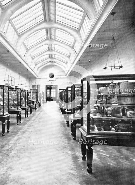 ...The Victoria and Albert Museum: in the ceramic section..., 1909. Creator: Clarke & Hyde.