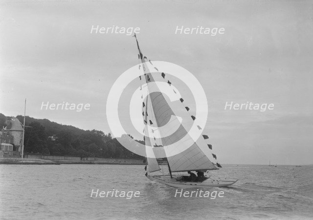 Saling yacht 'Asphodel' (K5) with prize flags, 1922. Creator: Kirk & Sons of Cowes.