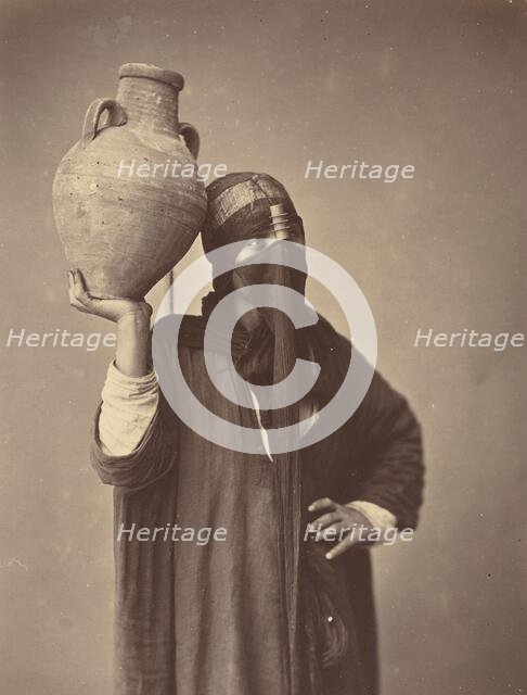 Porteuse d'eau au Caire [Water Carrier in Cairo], c. 1870. Creator: Felix Bonfils.