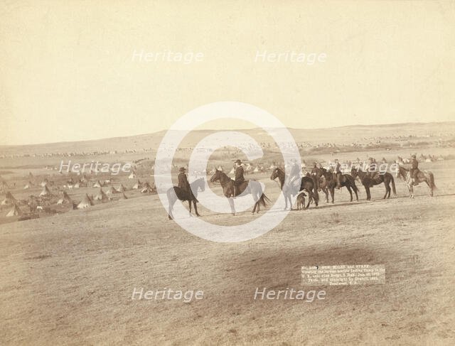 Gen Miles and staff viewing the largest hostile Indian Camp in the US, near Pine..., c1891. Creator: John C. H. Grabill.