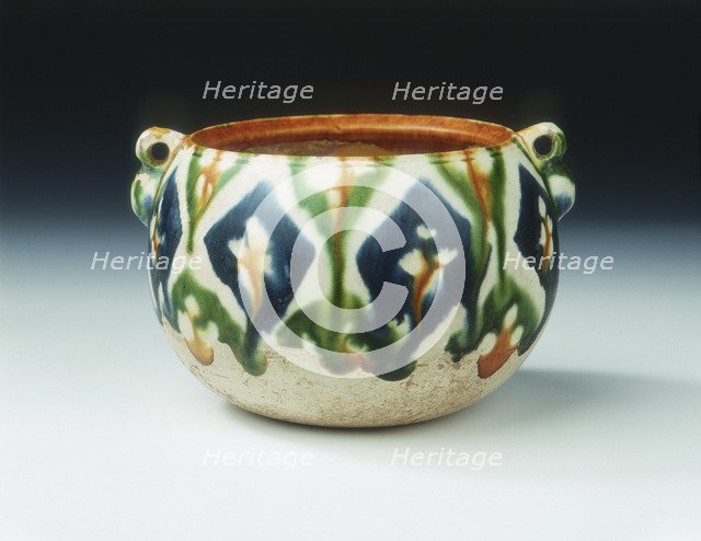 Sancai pottery jar with floral and geometric patterns, Tang dynasty, China, early 8th century. Artist: Unknown