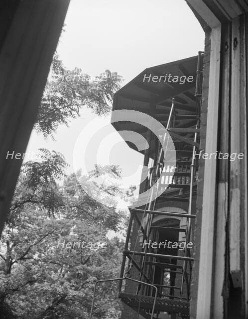 Balcony of house being wrecked on Independence Avenue, Washington, D.C, 1942. Creator: Gordon Parks.