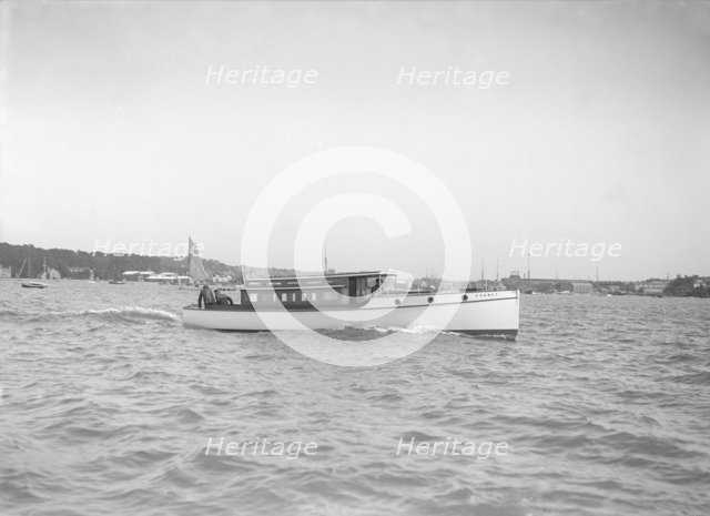 The motor launch 'Cygnet' under way, 1912. Creator: Kirk & Sons of Cowes.