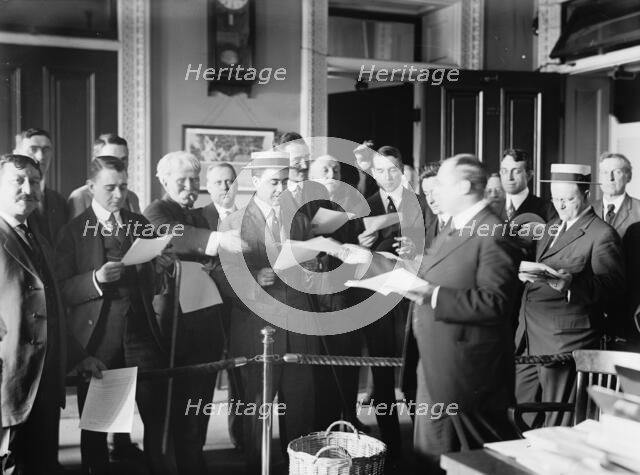 Press Correspondents with Howard Banks of Navy Dept., 1914. Creator: Harris & Ewing.