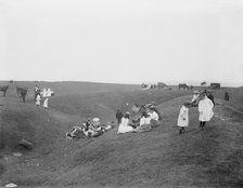 Bank Holiday picnic on the earthwork remains on White Horse Hill, Uffington, Oxfordshire, 1860-1922. Creator: Henry Taunt.