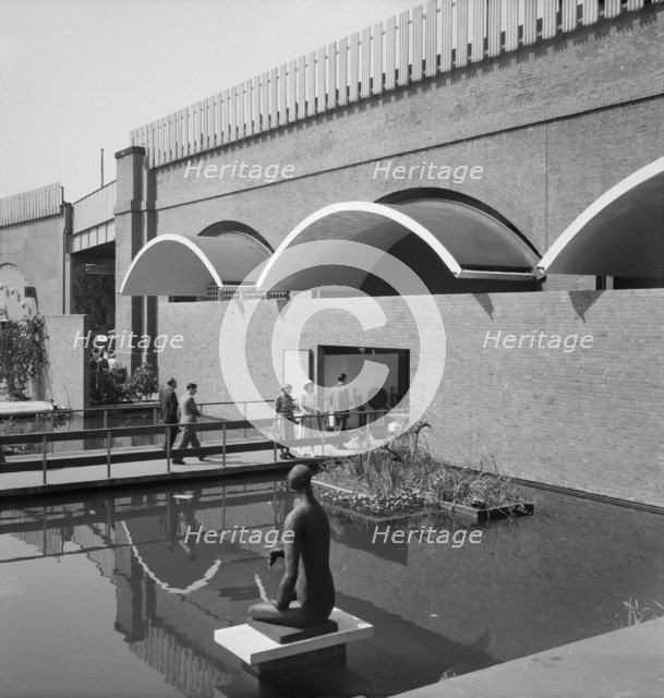Entrance to the 'Downstream' section, Festival of Britain site, South Bank, Lambeth, London, 1951. Artist: MW Parry.