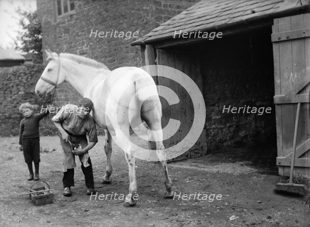 Farrier at Hellidon, Northamptonshire, c1896-c1920. Artist: Alfred Newton & Sons