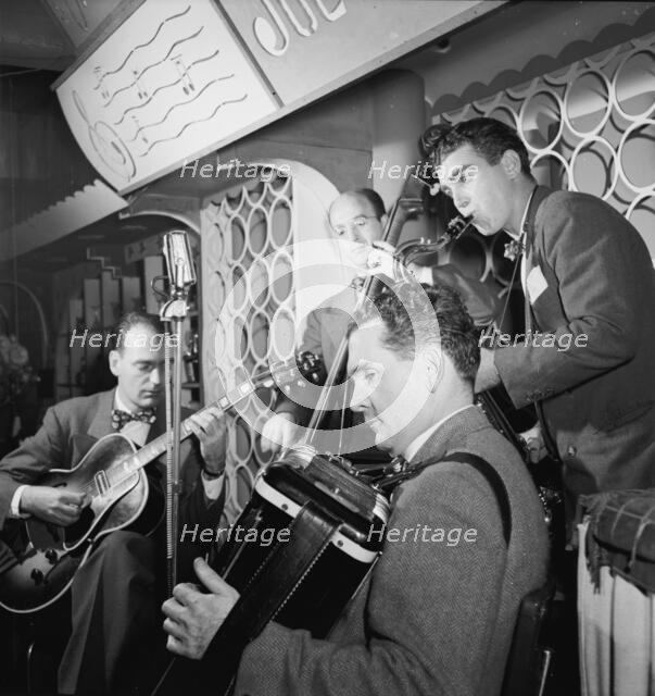 Portrait of Joe Mooney, Gaeton (Gate) Frega, and Andy Fitzgerald, Dixon's Steak House(?), N.Y., 1946 Creator: William Paul Gottlieb.