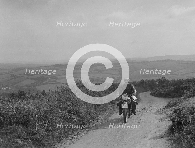 Motorcycle competing in the MCC Torquay Rally, 1938. Artist: Bill Brunell.
