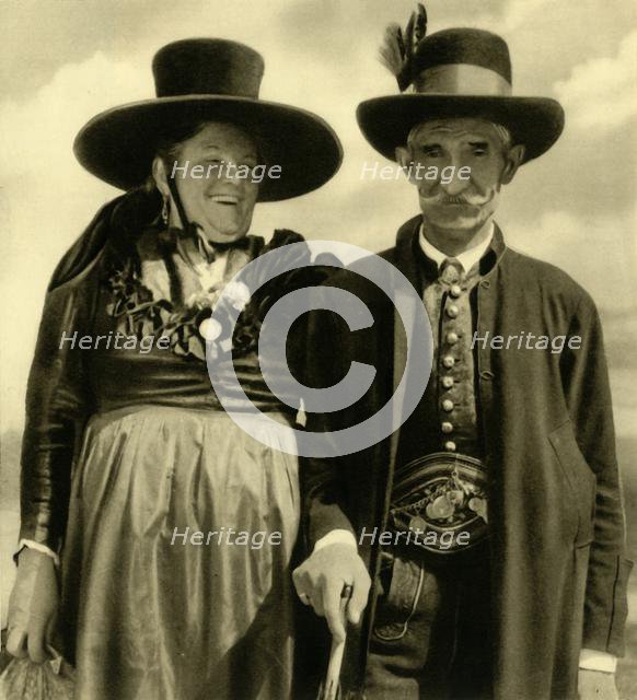 Couple in traditional dress, Sankt Lambrecht, Styria, Austria, c1935.  Creator: Unknown.