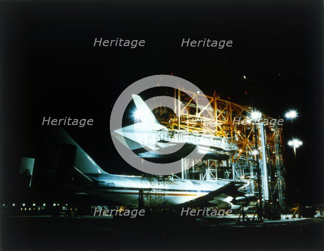 Space Shuttle and 747 carrier plane in Mate-Demate Device. Creator: NASA.