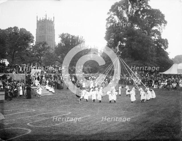 General view of village maypole dance, Chipping Campden, Cotswold, Gloucestershire, 1860-1922. Creator: Henry Taunt.