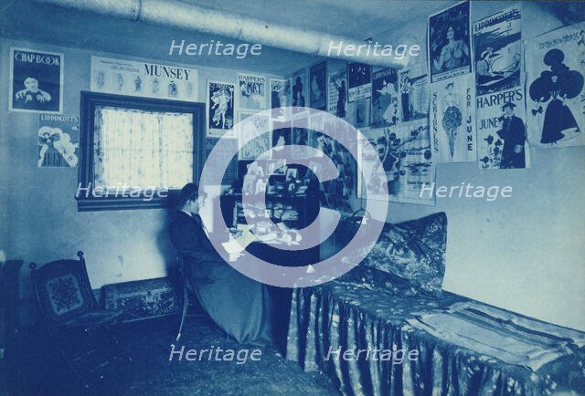 Frances Benjamin Johnston seated at a desk in her studio/office, with adverstising..., c1896. Creator: Frances Benjamin Johnston.