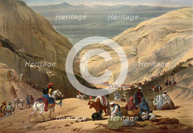 'Army Emerging from the Shutargardan Pass into the Logar Valley', c1840, (1901).  Creator: James Atkinson.