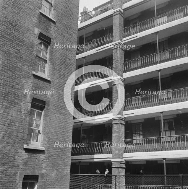 Block of flats with cast-iron railings along its balconies, Central London, 1955-1965. Creator: John Gay.