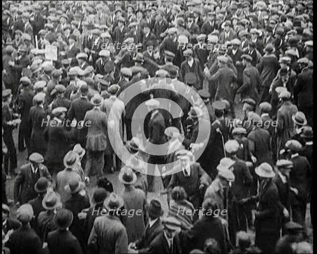 Disruptions and Fighting Breaking Out in the Crowd During a Speech by the Irish Chairman..., 1922. Creator: British Pathe Ltd.