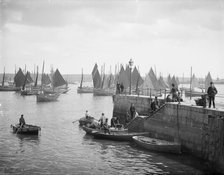 Fishermen unload their catches, Falmouth Pier, Falmouth, Cornwall, c1860-c1922. Artist: Henry Taunt