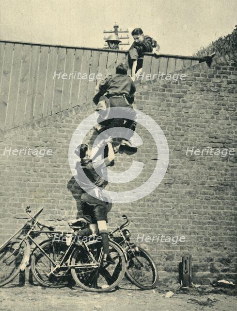 'Scouts Scaling a Wall', 1944. Creator: Unknown.