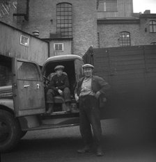 Lorry drivers at the sugar mill in Arlöv, Scania, Sweden, c1940s(?). Artist: Otto Ohm