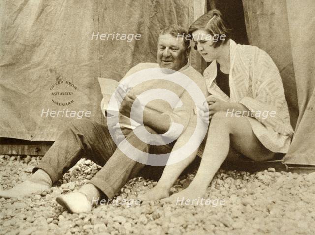 Gertrude Ederle receiving advice from her trainer Jabez Wolff, 1926, (1935). Creator: Unknown.