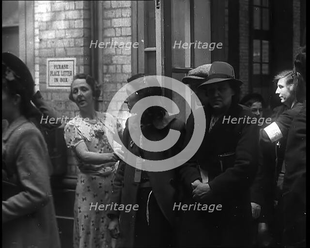 Dutch Refugees Entering a Reception Centre in the United Kingdom, 1940. Creator: British Pathe Ltd.