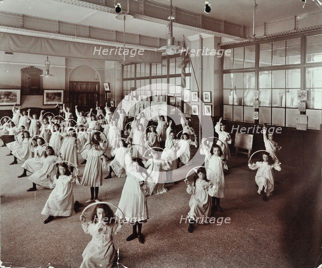 Girls with hoops, Lavender Hill Girls School, Bermondsey, London, 1906. Artist: Unknown.
