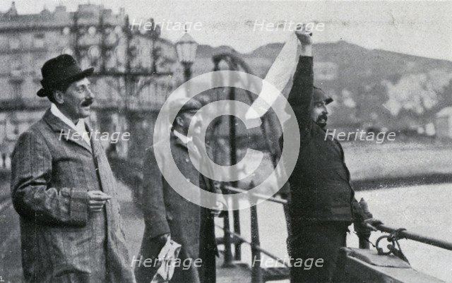 Louis Blériot on the pier at Dover after his flight across the English Channel, 25 July 1909. Artist: Unknown